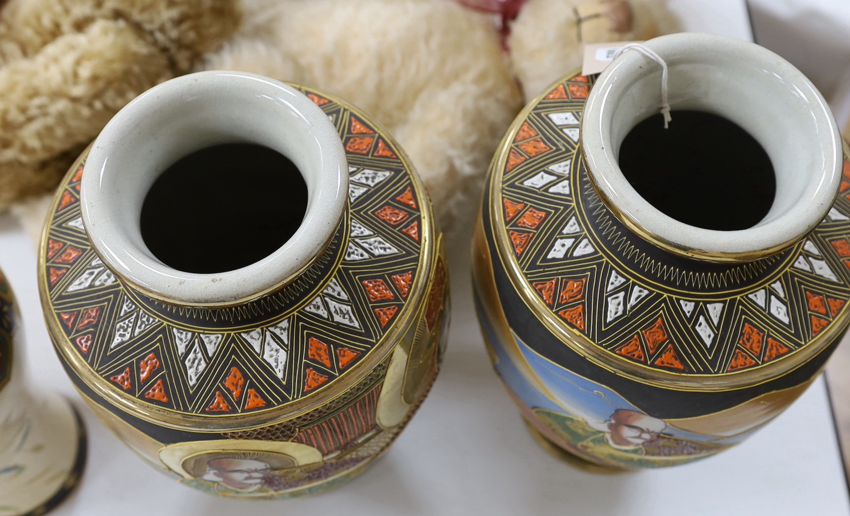Two pairs of Japanese vases. Tallest 38cm